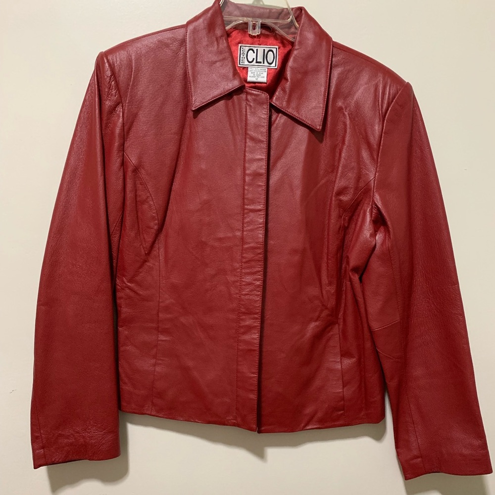 Red 100% leather jacket. Never worn.